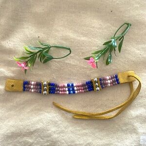 Handmade Native Beaded Bracelet on a Leather Strap Adjusts to size. UNIS…